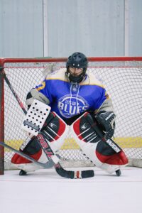A fan wearing his LGBR jersey in a roller hockey game