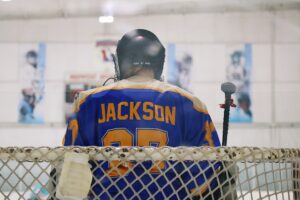 A fan wearing his LGBR jersey in a roller hockey game