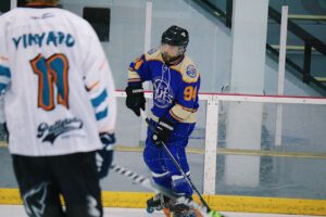 Jeff wearing his LGBR jersey in a roller hockey game